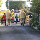 Firefighters at the scene of the house fire in Balclutha today. Photo: John Cosgrove