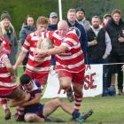 Clutha tight head prop Phil Keighley breaks through the West Taieri defence to make some yards...