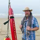 Paul Barron, of Dunedin, dries off after his inaugural Kaka Point Surf Life Saving Club Midwinter...