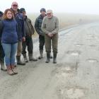  Concerned about the deteriorating state of Waitahuna West Rd in South Otago are (from left)...