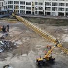 The boom of a large crane nicknamed ‘‘Stretch’’, which is being assembled at the site of the new...