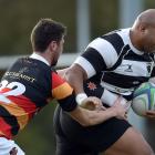 Southern prop Michael Mata’afa tries to break the tackle of Zingari-Richmond replacement back...