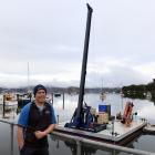 Careys Bay Marine Services owner Eldon Donaldson with his new pile-driver at Deborah Bay. PHOTO:...