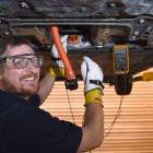 Otago Polytechnic automotive engineering senior lecturer and technician Elliot King tests...