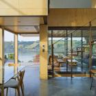 An open-plan layout and "see-through" staircase ensure that Otago harbour can be seen from almost...
