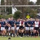 St Andrew's College captain Will Stodart checks how much time is remaining after St Thomas of...