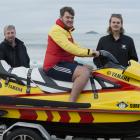 Surf Life Saving New Zealand Otago operations committee chairman Cameron Burrow, on jet ski, and ...