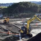 Contractors dig up the learn-to-ride track at Marlow Park on Tuesday to make way for a new...