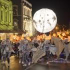 Costume-clad revelers packed the streets around the Octagon for the Midwinter Carnival. Photos:...