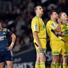 Watching the big screen at Forsyth Barr Stadium on Saturday night are Highlanders first five...