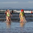Strolling back after a refreshing dip were Riverton locals Pat Kemp and Mayana Allen.