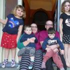 Sarah and Jason McCook, with their children (from left) Isabel (6), Cooper (2), Connor (4) and...