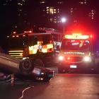 Emergency services attend a crash in Macandrew Rd. PHOTO: PETER MCINTOSH