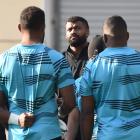  The Fijian team takes a moment during the Captain’s Run at Forsyth Barr Stadium yesterday. Photo...