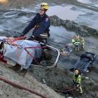 Lifting a practice patient to safety in a training drill at Palmers Quarry in Dunedin yesterday...