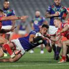 Eliesa Katoa crashes over to score for the Warriors against St George Illawarra. Photo: Getty Images