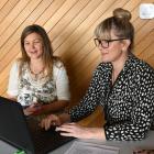 Job-seeker Kirsten Koch (left) discusses CVs and cover letters with Nicki McNutt, of Workbridge,...