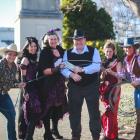  Encouraging Waimate District Council chief executive Stuart Duncan (centre) to buy a ticket for...
