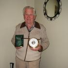 Fred Inder holds some of the many awards he received. PHOTO: THE NEW ZEALAND HERALD