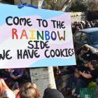 A crowd of about 150 supporters of the rainbow community gathered in protest against the Speak Up...