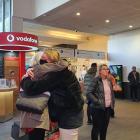 Love ones reunite at Queenstown Airport today. Photo: Matthew Mckew