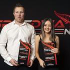 Otago drivers Benji Smaill and Madi Stewart with the prizes they won at the New Zealand Speedway...