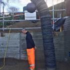 Arrowtown sculptor Shane Woolridge demonstrates the ‘‘field punishment No1’’ position, the...