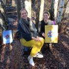 WAO Summit organiser Monique Kelly and event organiser Olivia Bonifant (right) show the poster...