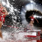 Moroccan athletes Soufiane Elbakkali and Mohamed Tindouft compete during the final of the men’s...