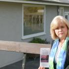 Adrienne Scott outside the short-term studio at her home in Balclutha, for which she is being...