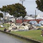 Carpets and flood waste line the streets of Westport after floods devastated the region last week...