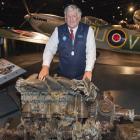 Chris Checketts with the Rolls-Royce Merlin engine from his father’s Spitfire that was shot down...