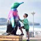 Checking out a 2m-tall penguin sculpture that made an appearance at the St Clair esplanade on...