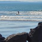 BUSTED: This surfer rides against the tide of public opinion - in Sumner - during the Covid-19...