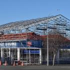 Scaffolding is erected at the Salvation Army Family Store in Princes St yesterday in preparation...