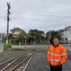 KiwiRail Dunedin freight operations manager Jamie McFarland stands at the Wickliffe Tce rail...