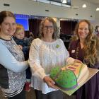 The Breast Room founder and breast-feeding counsellor Denis Ives (centre) holds the 10th...