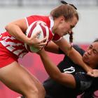 Alina Arterchuk of the Russian Olympic Committee in action against New Zealand’s Alena Saili...