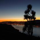 Dunedin city basks in a the red glow of high-pressure sodium lights in a view from Highcliff Rd...