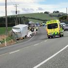 Emergency services at the scene this afternoon. Photo: Barry Stewart
