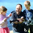 Looking forward to a fish dinner are (from left) Arah, Matthew and Fletcher Parks, of Allanton,...