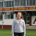Alhambra-Union Rugby Football Club committee member and player Katie Hensman stands in front of...