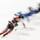 Canadian Kim Boutin leads the pack in the women’s 1500m quarterfinals at the short track ice...