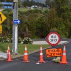 Police closed off roads in Glenleith after a body was found. Photo: Gregor Richardson 