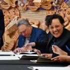 Conservation minister Kiritapu Allan signs the agreement in Bluff today. Photo: Laura Smith

