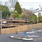 Builders work on a new home on the corner of Meadow St and Queens Dr, in Mornington, last week....