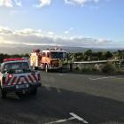 Firefighters at the Orokonui Ecosanctuary carpark. Photo: Wyatt Ryder