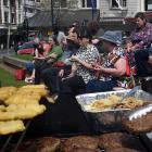  Unions Otago members enjoy a barbecue in the Octagon to celebrate Labour Day. PHOTO: STEPHEN...