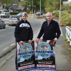 Dunedin Marathon organisers Maria Sleeman and Stu McCormack show off some advertising which will...
