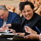 Conservation Minister Kiritapu Allan signs the Southland Aquaculture Agreement in Bluff yesterday...